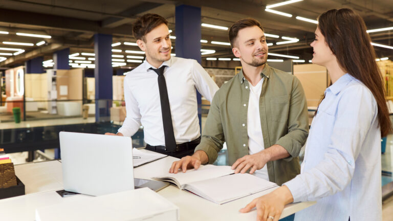three coworkers in manufacturing